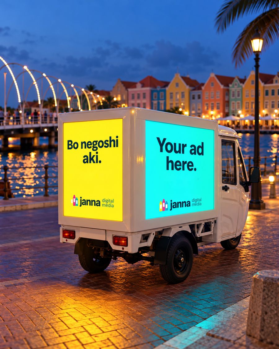 The Janna tuk-tuk in Otrobanda at night, Punda lit up across the water